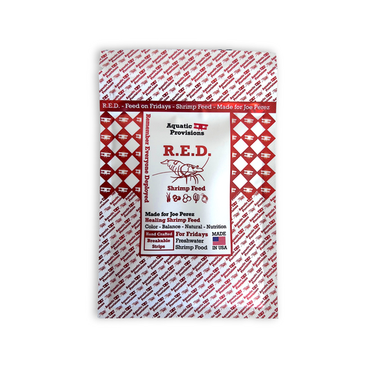 R.E.D. Shrimp Feed packaging with red and white checkered pattern on a white background