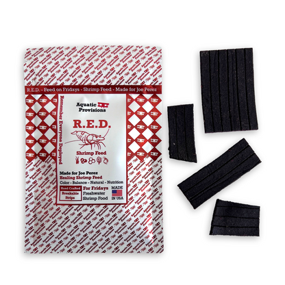 R.E.D. Shrimp Feed packaging with black rectangular feed packets on a white background